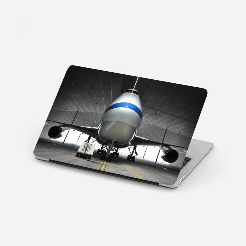 Laptop sticker front-facing cargo jet in hangar