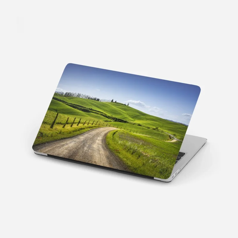 Laptop sticker Tuscany country road through rolling green hills