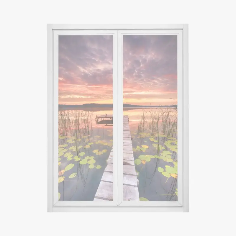 Window decal sunrise over a tranquil lake pier