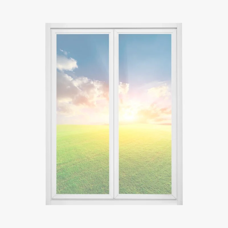 Window decal sunlit meadow at sunset