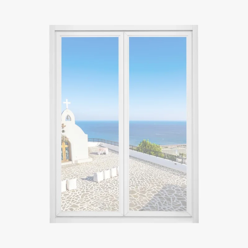 Window decal white chapel overlooking the sea in Faliraki