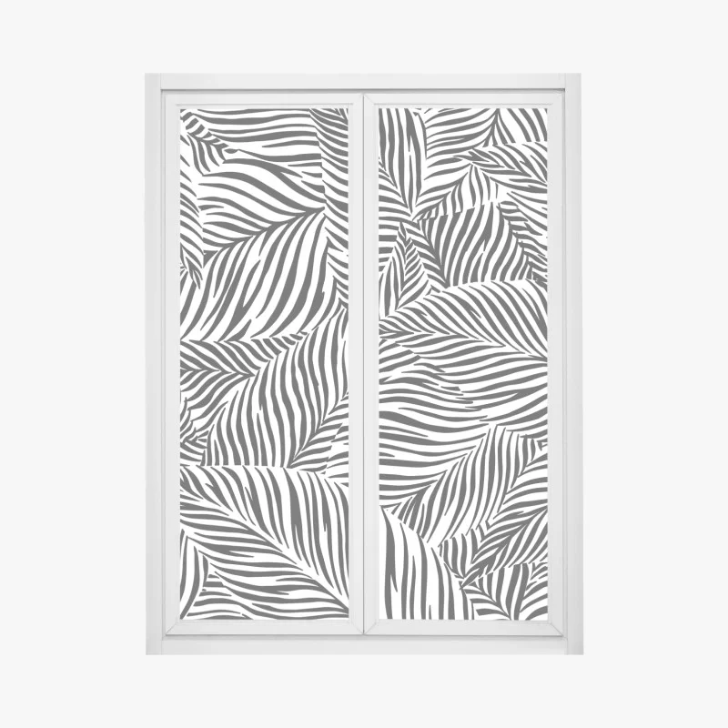 Window decal monochrome tropical leaf pattern