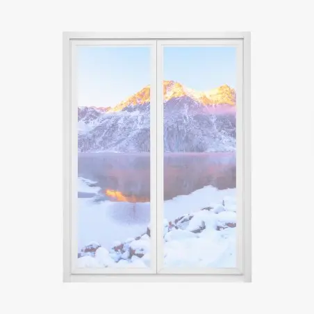 Window decal sunlit mountains over frozen alpine lake • Wallissimo®