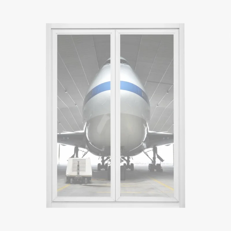 Window decal front-facing cargo jet in hangar