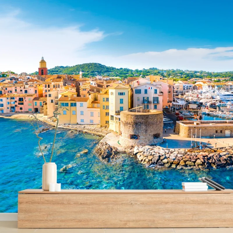 Wall mural sunlit Mediterranean harbor cityscape