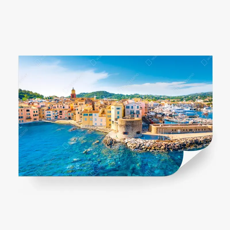 Wall mural sunlit Mediterranean harbor cityscape