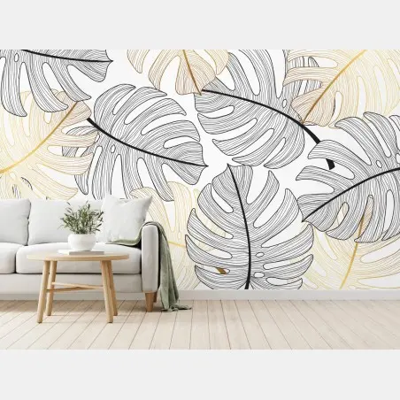 Wall mural monstera leaf pattern with gold accents • Wallissimo®
