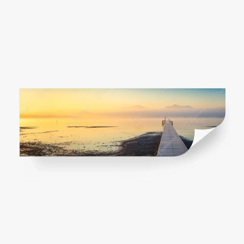 Wall mural misty sunrise over wooden pier