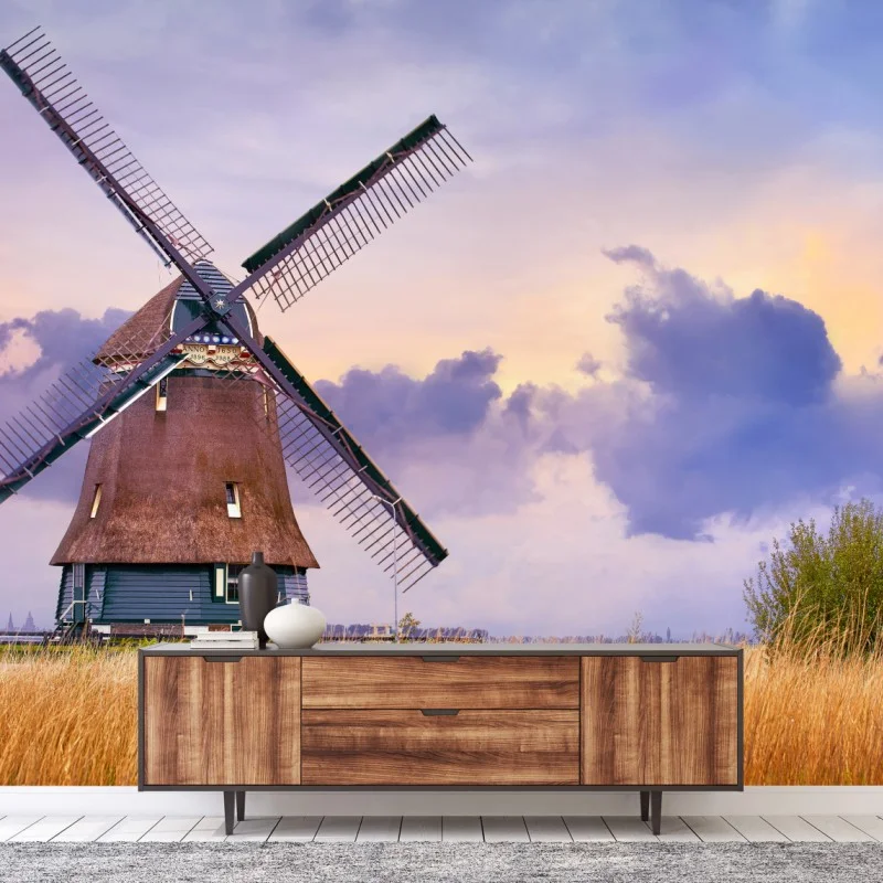 Wall mural historic windmill in golden fields