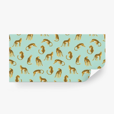 Wall mural playful cheetah pattern on turquoise background • Wallissimo®