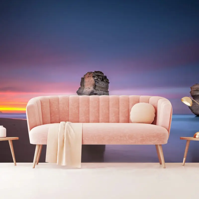 Wall mural serene coastal rock formations at sunset