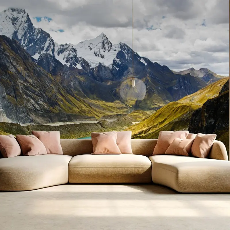 Wall mural turquoise alpine lake beneath snowy peaks