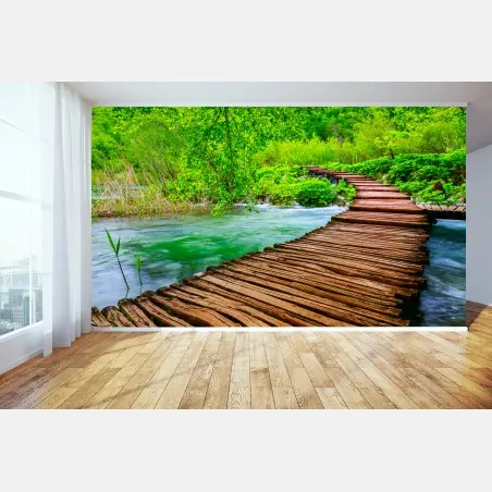 Wall mural serene green boardwalk over river • Wallissimo®
