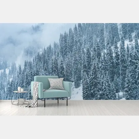 Wall mural misty snow-covered pine forest • Wallissimo®