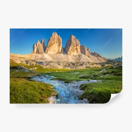 Wall mural Tre Cime di Lavaredo over alpine meadow • Wallissimo®
