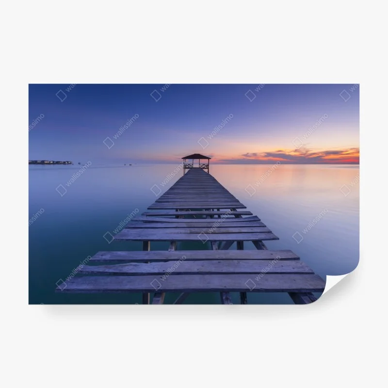 Wall mural tranquil wooden pier at sunset