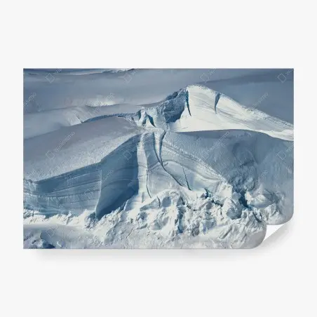 Wall mural pristine glacier crevasse in blue light • Wallissimo®