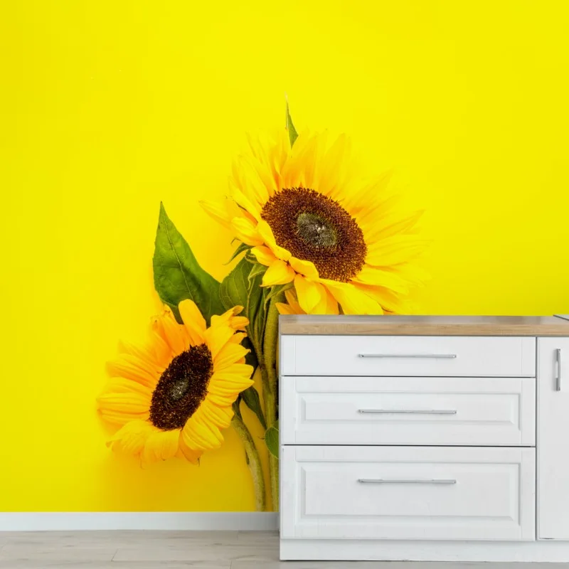 Wall mural bright sunflower bouquet on yellow background
