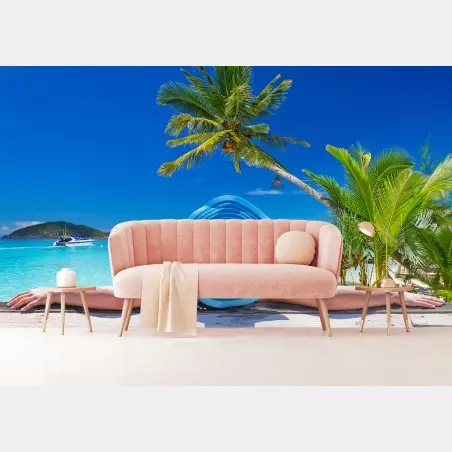 Wall mural tropical beach relaxation with blue sun hat • Wallissimo®