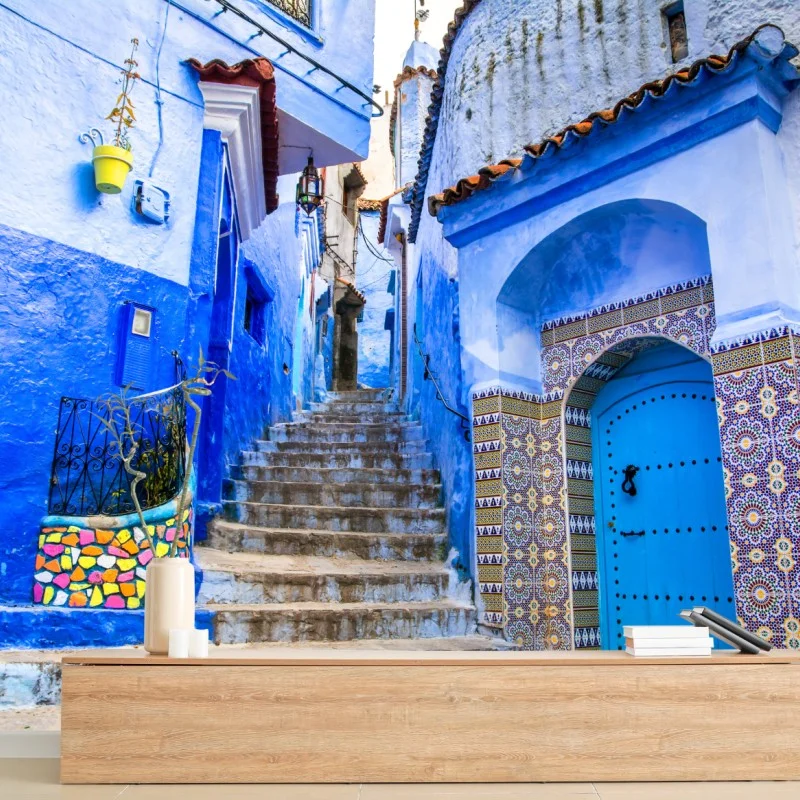 Wall mural charming blue alleyway in Chefchaouen, Morocco
