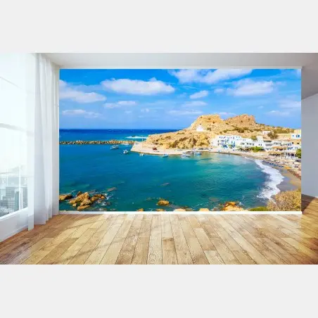 Wall mural sunlit Finiki harbor, Karpathos coast • Wallissimo®