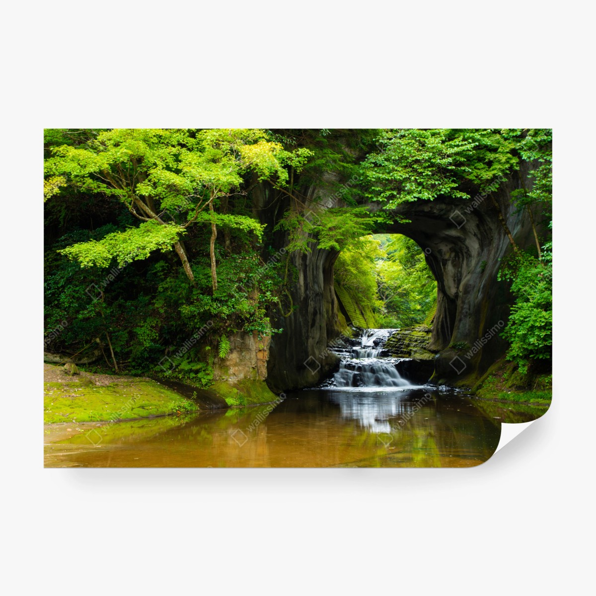 Wall mural hidden waterfall through a rock arch • Wallissimo®