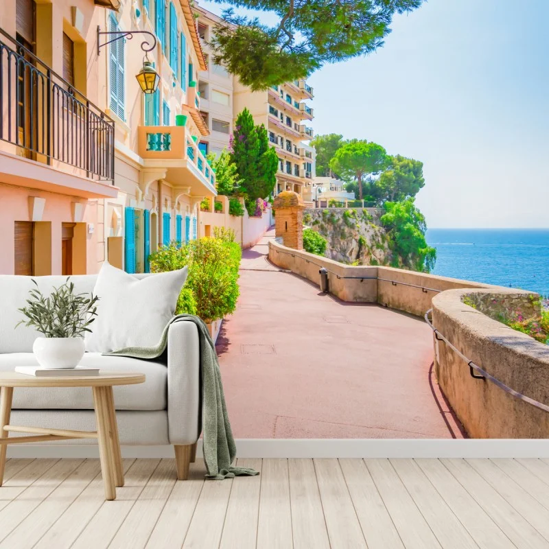 Wall mural mediterranean seaside promenade with pastel buildings