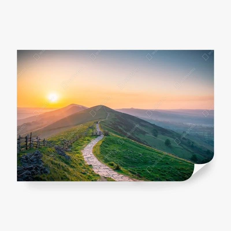Wall mural sunrise ridge path over rolling hills