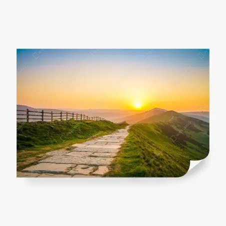 Wall mural sunlit mountain ridge at sunrise • Wallissimo®