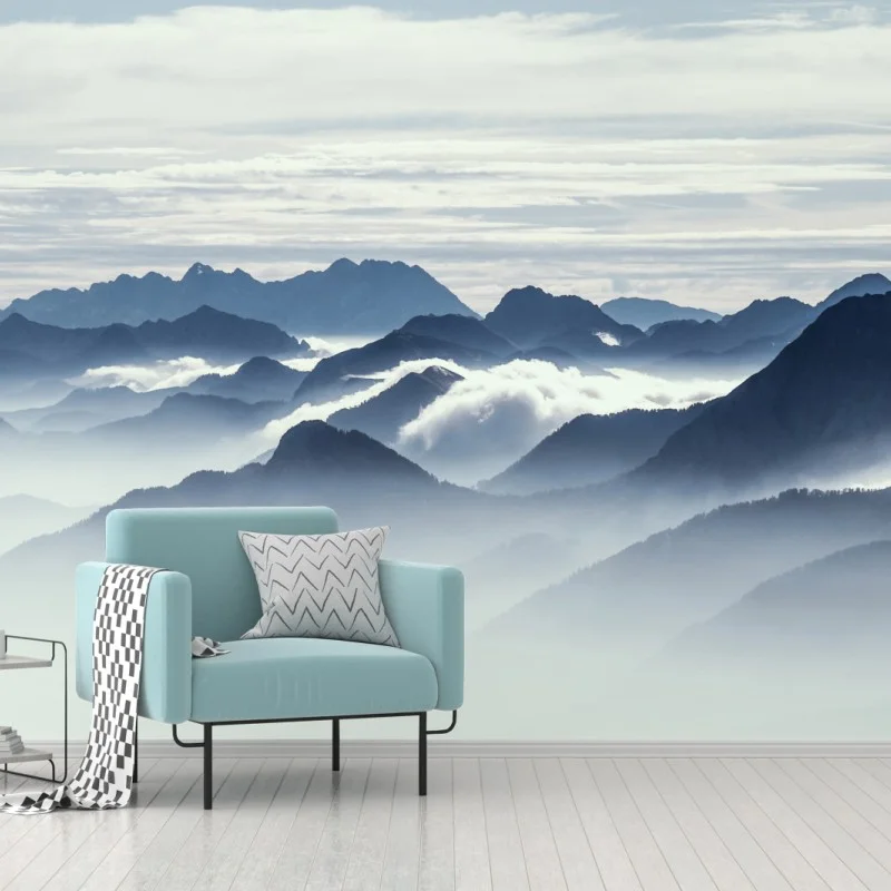 Wall mural misty mountain layers at dawn