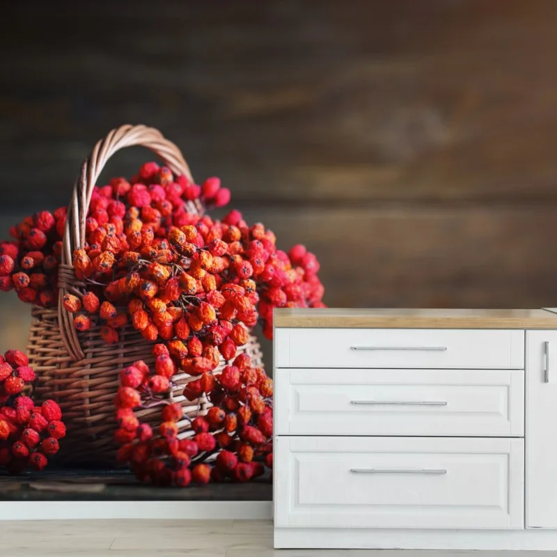Wall mural autumn rowan berries in wicker basket