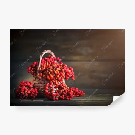 Wall mural autumn rowan berries in wicker basket • Wallissimo®