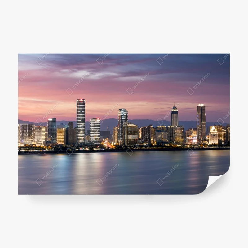 Wall mural tranquil city skyline at dusk