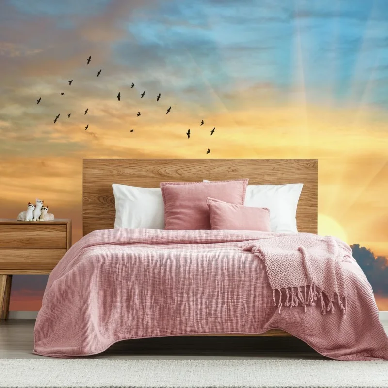 Wall mural golden sunrise over clouds