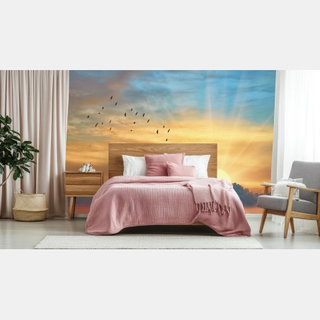 Wall mural golden sunrise over clouds • Wallissimo®