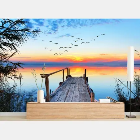 Wall mural sunset pier over tranquil lake • Wallissimo®
