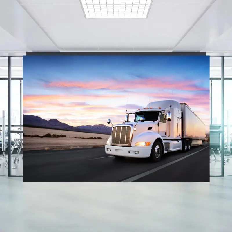Wall mural sunset highway truck in motion