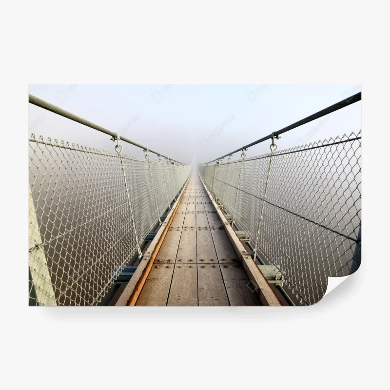Wall mural misty suspension bridge leading into fog