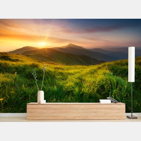 Wall mural sunrise over emerald mountain valley • Wallissimo®