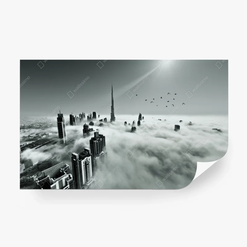 Wall mural misty Dubai skyline above the clouds