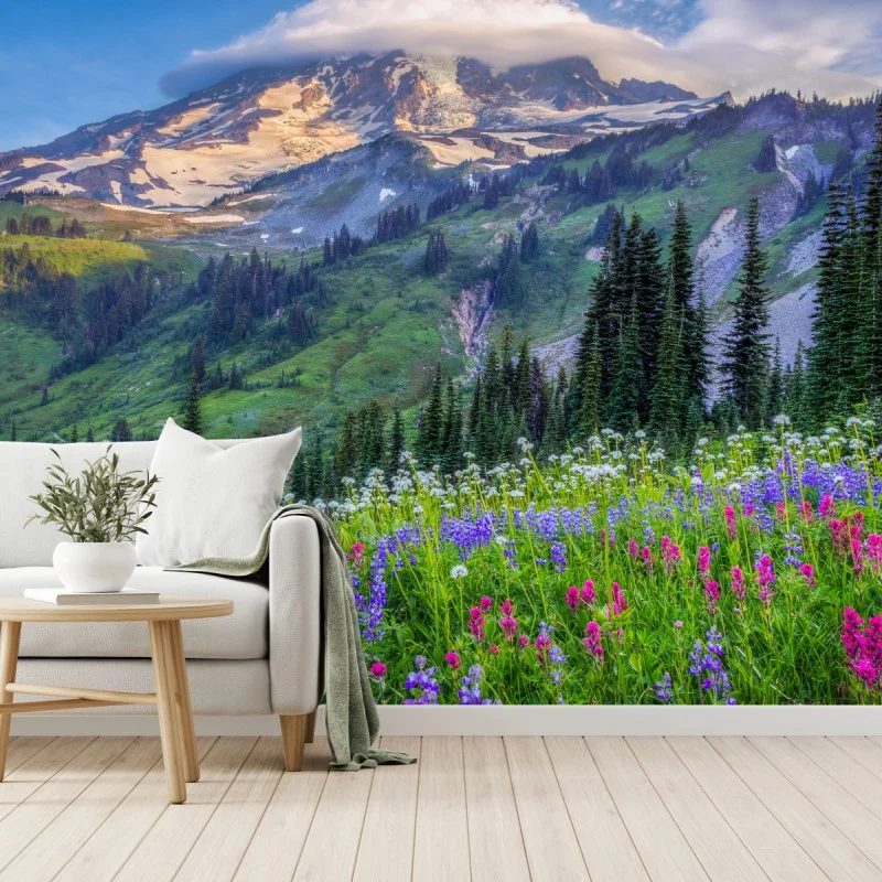 Wall mural alpine wildflower meadow beneath snow-capped mountain