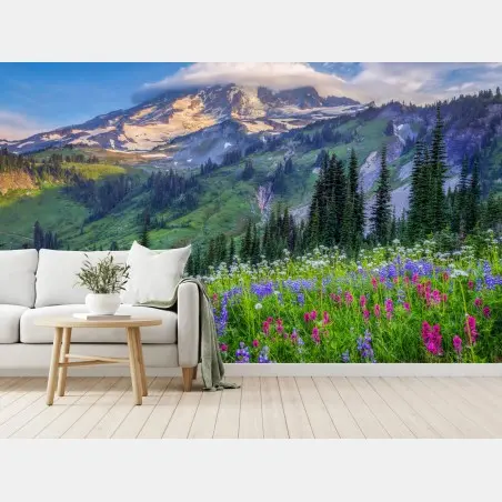 Wall mural alpine wildflower meadow beneath snow-capped mountain • Wallissimo®