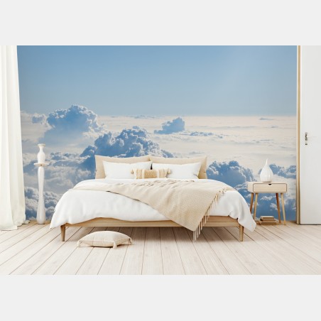 Wall mural aerial cloudscape over soft blue sky • Wallissimo®