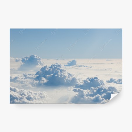Wall mural aerial cloudscape over soft blue sky • Wallissimo®