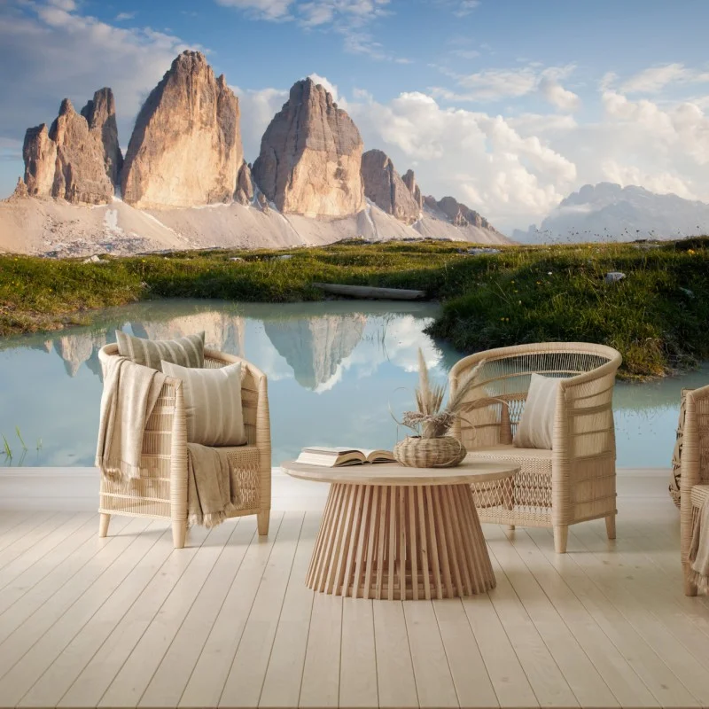 Wall mural sunlit alpine peaks reflected in a tranquil lake