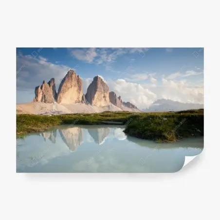 Wall mural sunlit alpine peaks reflected in a tranquil lake • Wallissimo®