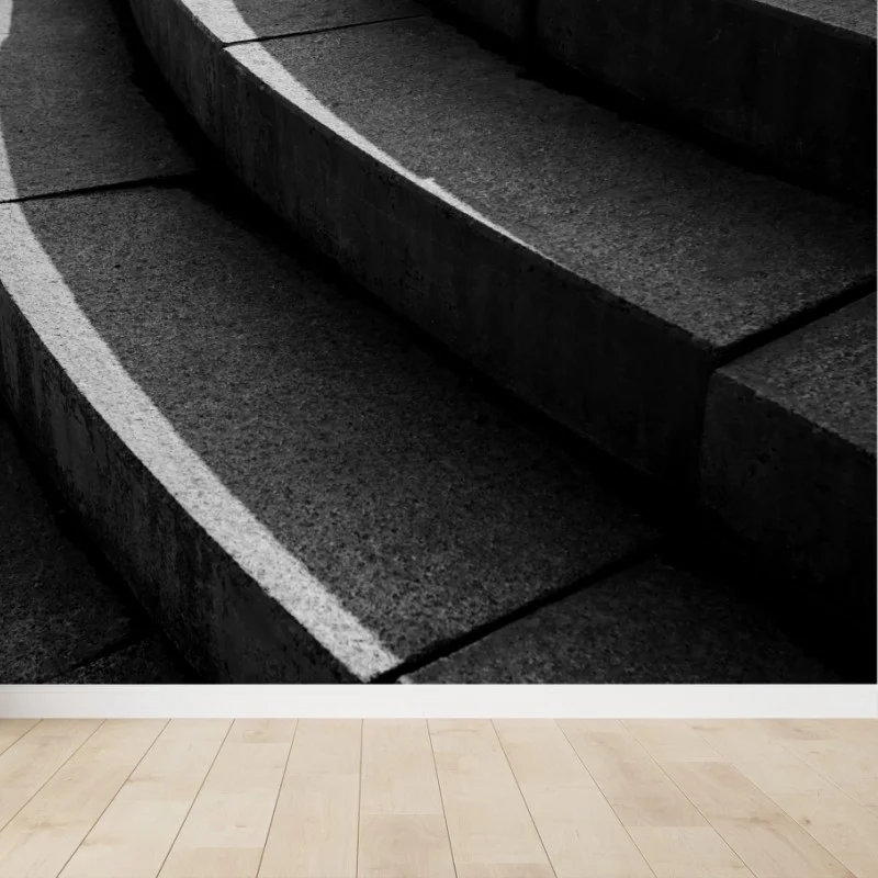 Wall mural curved concrete staircase in shadow