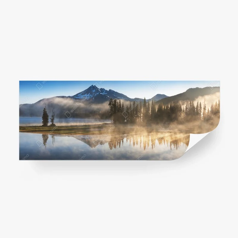 Wall mural misty mountain reflection at sunrise