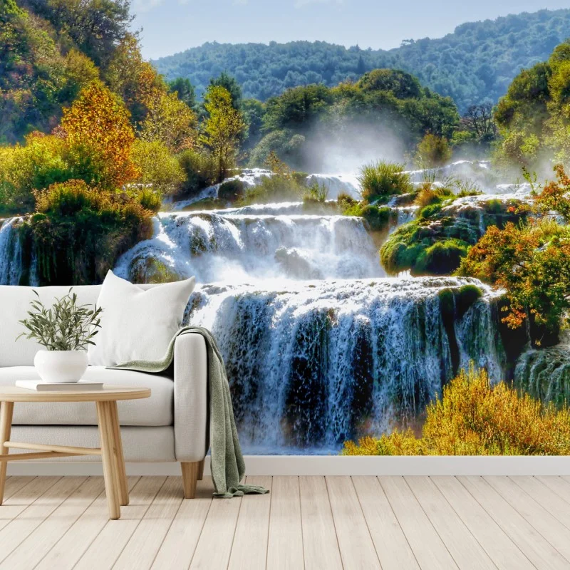 Wall mural cascading waterfall in lush forest