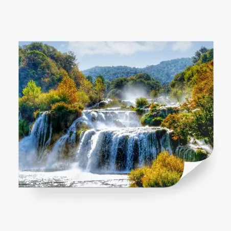 Wall mural cascading waterfall in lush forest • Wallissimo®